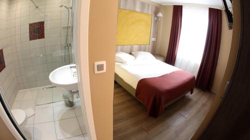 Koupelna v ubytování Hotel Phenix