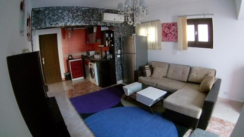 Kuchyň nebo kuchyňský kout v ubytování Deluxe Apartment Delta Sharm