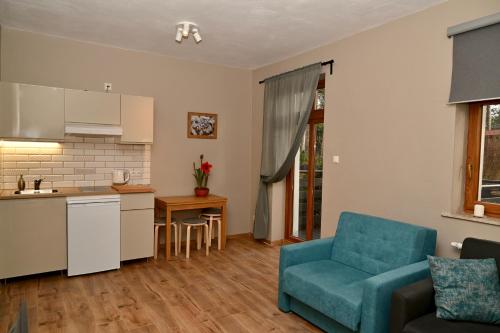 Kuchyň nebo kuchyňský kout v ubytování Apartamenty Generalskie