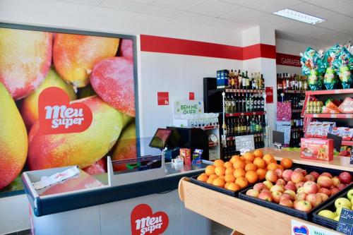 a store with a display of fruits and vegetables at Harmony apartment in Mindelo São Vicente in Mindelo
