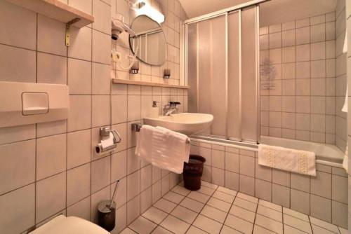 Ванна кімната в Hotel Kurpark