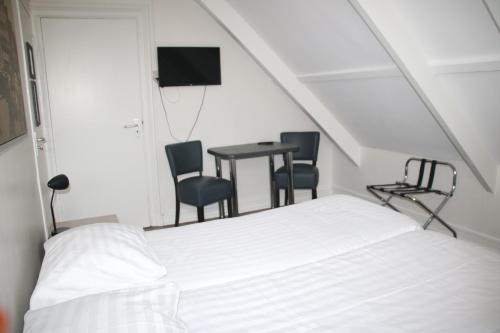 Una cama o camas en una habitación de Hotel Hortus
