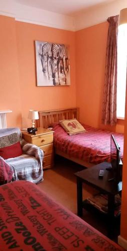 Katil atau katil-katil dalam bilik di Lea Hurst B & B