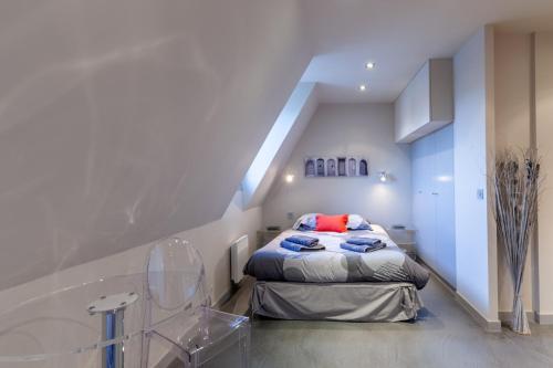 Voodi või voodid majutusasutuse CMG Place Morny/ Deauville toas