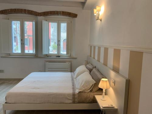 Postel nebo postele na pokoji v ubytování B&B Nonna Teresa