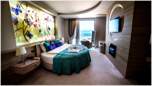 Katil atau katil-katil dalam bilik di Grand Asya Hotel