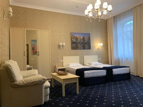 Ліжко або ліжка в номері Amsterdam Hotel