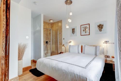 Postel nebo postele na pokoji v ubytování Hotel Una