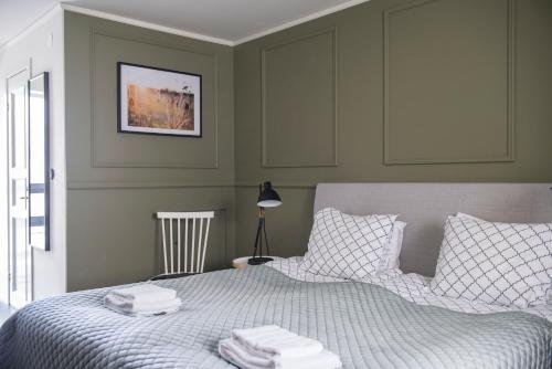 Cama o camas de una habitación en Värdshuset Lindgården