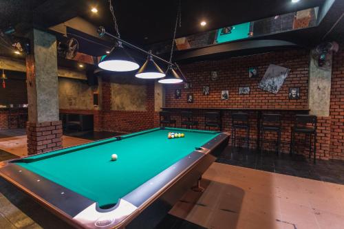 a billiard room with a pool table in it at Old Town in Jomtien Beach