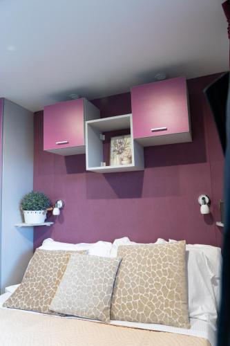Letto o letti in una camera di Internazionale - Family Village
