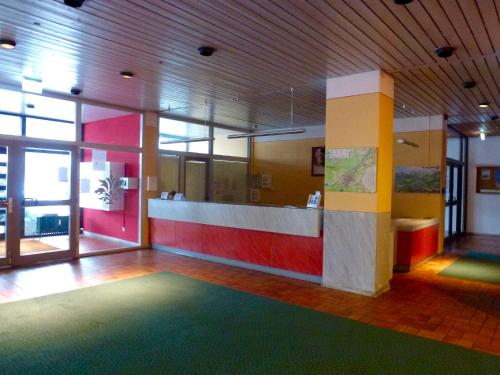 a large room with colorful walls and a colorful floor at Ferienwohnung 424 mit Hallenbad in Bad Reichenhall