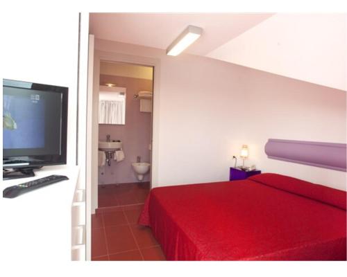 TV a/nebo společenská místnost v ubytování Hotel Residenza Giardino
