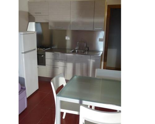 Kuchyň nebo kuchyňský kout v ubytování Hotel Residenza Giardino
