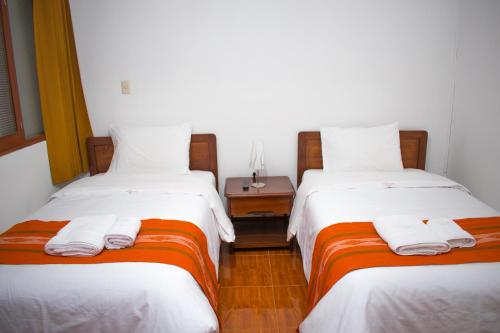 Explorer Deluxe Hotelにあるベッド