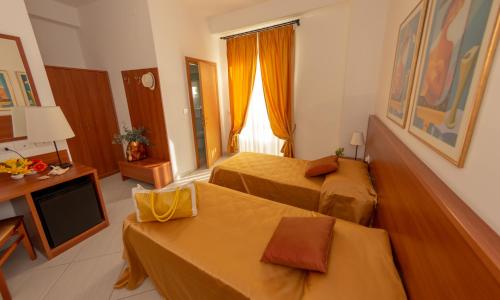 Cama o camas de una habitación en Hotel Solaria