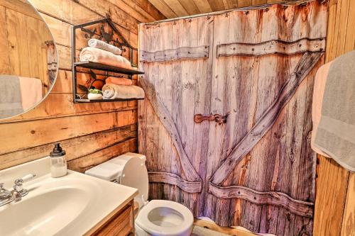Gallery image of Authentic Log Cabin with Fire Pit, Pond, and More! in Broken Bow