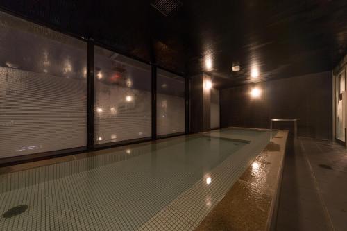 a room with a glass floor in a building at Hotel Resol Trinity Sapporo in Sapporo