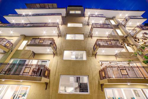 an overhead view of an apartment building with balconies at Bedzzz Rishikesh by Leisure Hotels in Rishīkesh