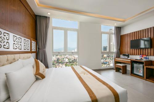 Giường trong phòng chung tại Prague Hotel