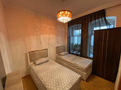 Foto da galeria de Cozy Old City Apartment em Baku