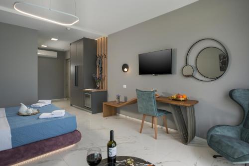 Blue Elephant Boutique Hotel & Spa - Adults Onlyにあるテレビまたはエンターテインメントセンター