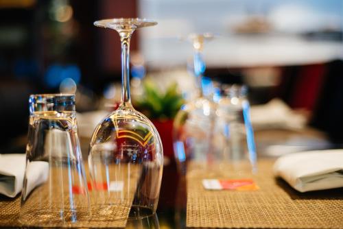 a close up of a glass bottle on a table at The Bodhi Tree in Leh