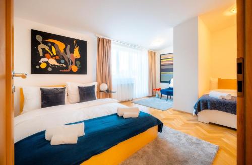 Postel nebo postele na pokoji v ubytování Klimentska Cartoon apartments