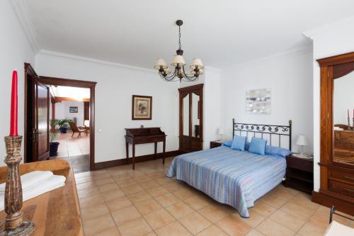 Säng eller sängar i ett rum på VILLA BELLAVISTA DE LOS VALLES
