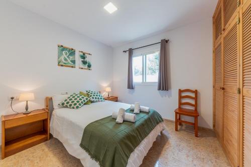 Ένα ή περισσότερα κρεβάτια σε δωμάτιο στο Villa Bahía de Palma - Family Only