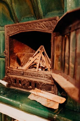 a pile of wood sitting on a table at Boutique Guesthouse „Domizil“, Valea Porumbacului in Porumbacu de Sus