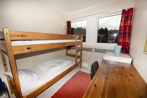 מיטה או מיטות קומותיים בחדר ב-Bergen Camping Park