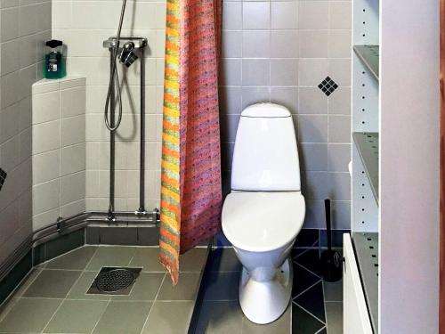 a bathroom with a toilet and a shower with at Holiday home in Ronneby in Ronneby