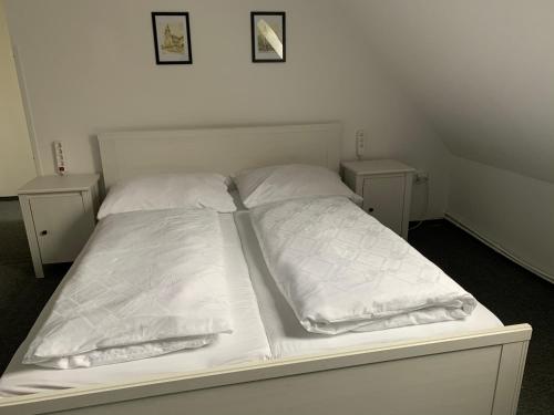 Кровать или кровати в номере Penzion Holiday