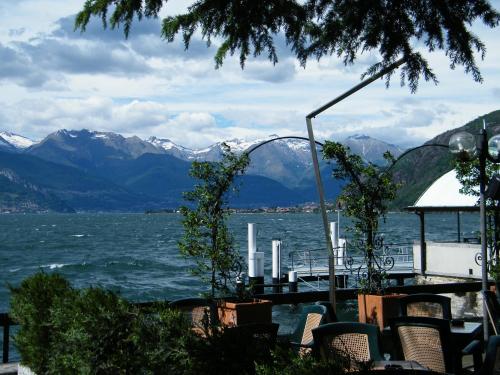 a view of a body of water with mountains at Hotel Locanda Mel in Calolziocorte