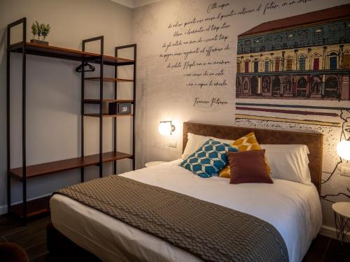 Un pat sau paturi într-o cameră la Galleria Sanfelice