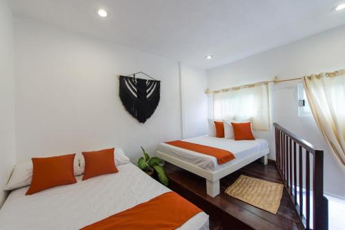 Katil atau katil-katil dalam bilik di Hotel Caracol Puerto Morelos