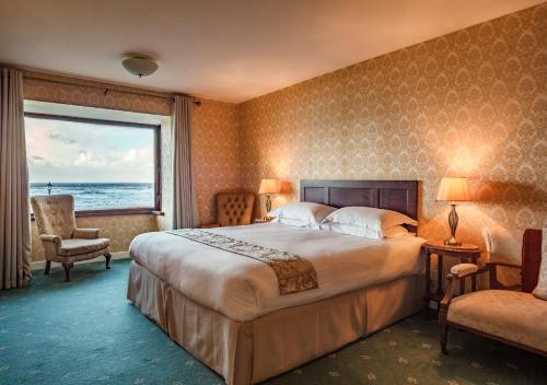 Postel nebo postele na pokoji v ubytování Sandhouse Hotel