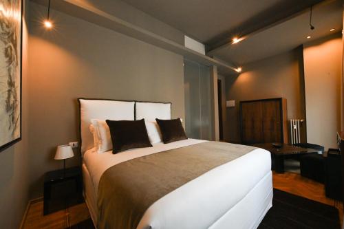 Ένα ή περισσότερα κρεβάτια σε δωμάτιο στο Ada Home