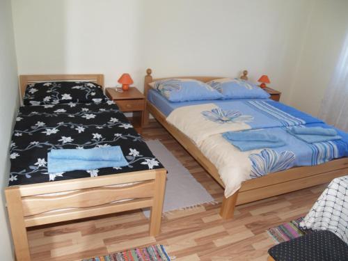 Postel nebo postele na pokoji v ubytování Rooms Žigić