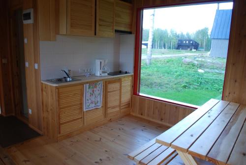 Kuchyň nebo kuchyňský kout v ubytování Kõveri Holiday Center