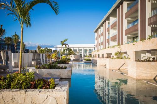 a view of the pool at the resort at Majestic Elegance Costa Mujeres - All Inclusive in Cancún