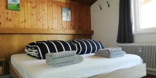 Postel nebo postele na pokoji v ubytování Haus Dienten Top 11
