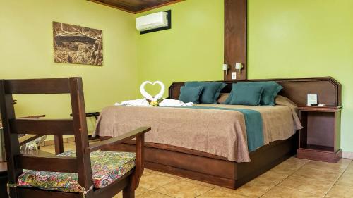 Volcano Lodge, Hotel & Thermal Experienceにあるベッド