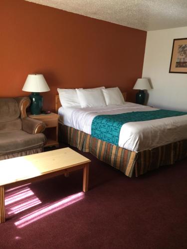 Кровать или кровати в номере Tiki Lodge