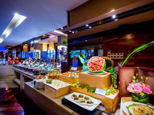 a store filled with lots of different types of food at Grand Mercure Xiamen Downtown-Free Welcome Fruit & Metro Station in Xiamen