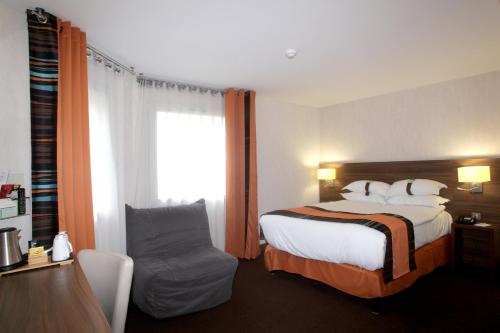 Postel nebo postele na pokoji v ubytování Holiday Inn Paris Montmartre by IHG
