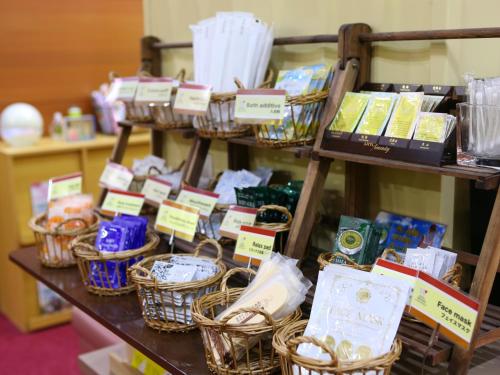 a display of baskets and books on a table at Hotel Wing International Ikebukuro in Tokyo