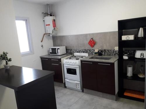 A kitchen or kitchenette at Costanera.VM
