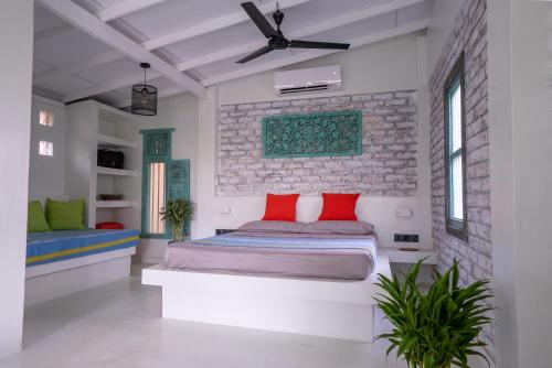 Ένα ή περισσότερα κρεβάτια σε δωμάτιο στο Your Dream Bungalow - Mirissa
